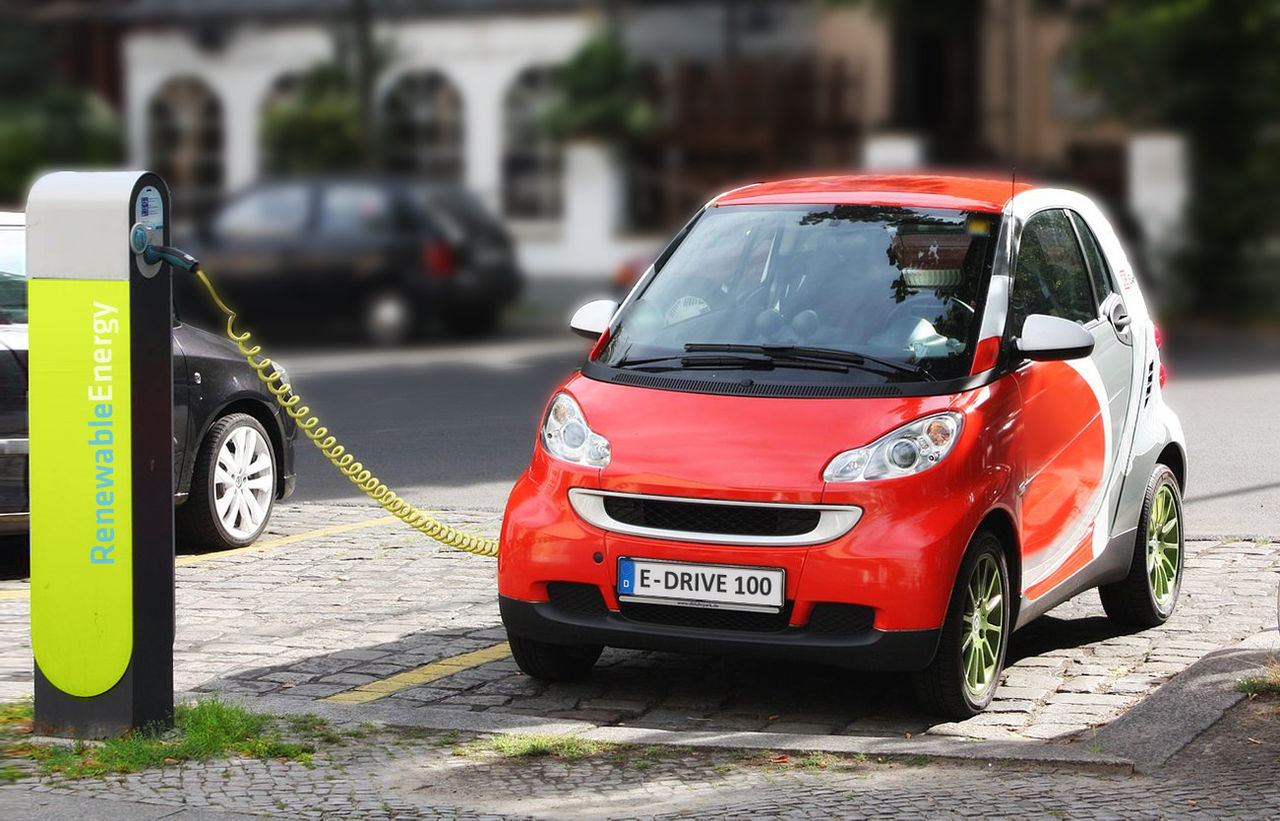 1280px-Electric_Car_recharging.jpg